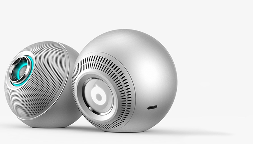 Two silver Luna wireless speakers